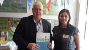 Peter Dicker Foodbank Manager explaining the scope of the project to Diane Wood Owner Director of Community Windfarms